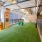 a dog park with green grass