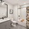 a bathroom with a shower and sink