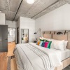 a bedroom with a bed and a nightstand