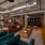 a clubhouse room with a couch and chairs