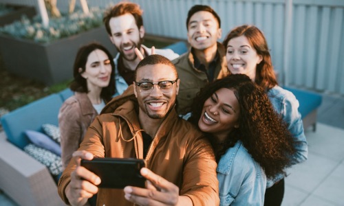 a group of people posing for a photo