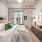 a bedroom with a bed and a desk
